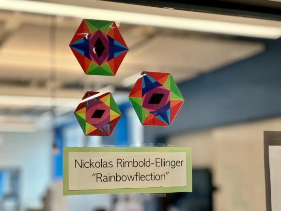 Rainbow geometrical patterns created in a math explorations class.