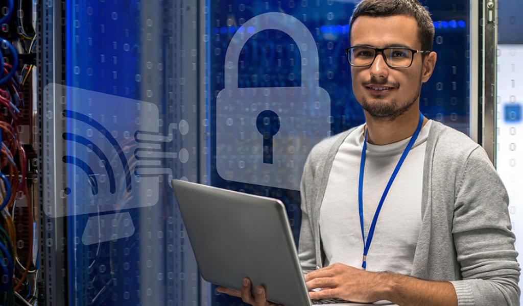 guy with laptop and blue lock in background 